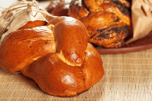 Freshly baked bread on wooden table