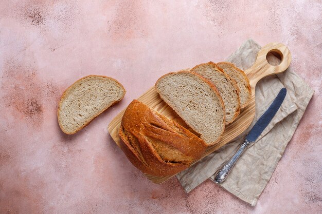 Freshly baked rye wheat bread sliced.