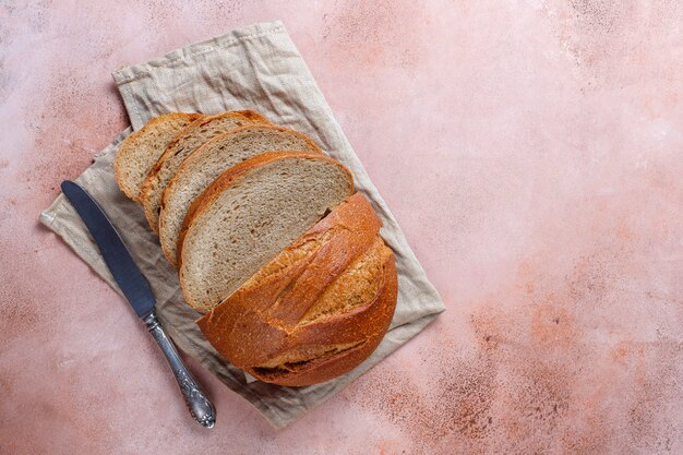 Freshly baked rye wheat bread sliced.