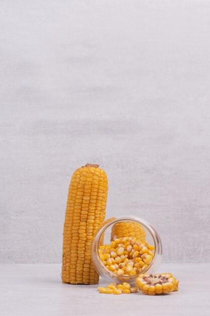 Freshly boiled corns in glass bowl.