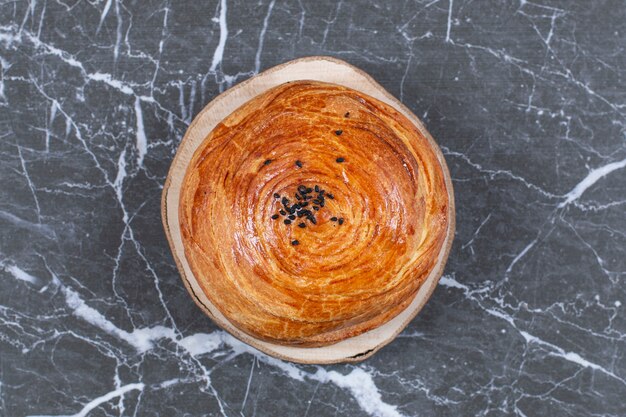 Freshly cooked Azerbaijan national pastry gogal , on the marble surface