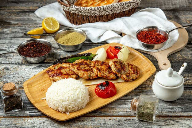 fried chicken cutlets rice tomato side view