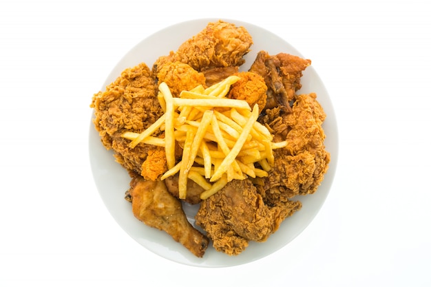 Fried chicken and french fries in white plate