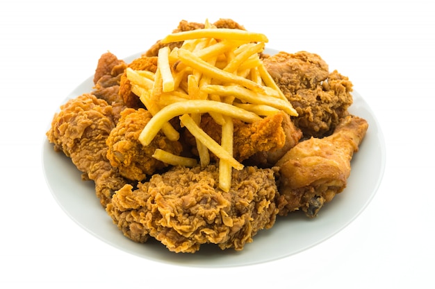 Fried chicken and french fries in white plate