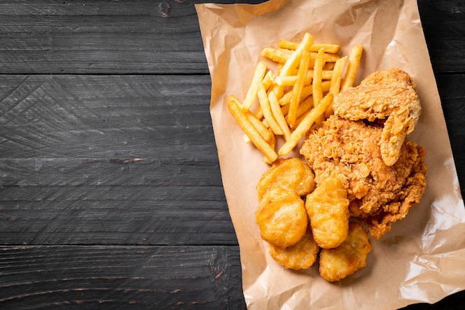 Fried chicken with french fries and nuggets meal