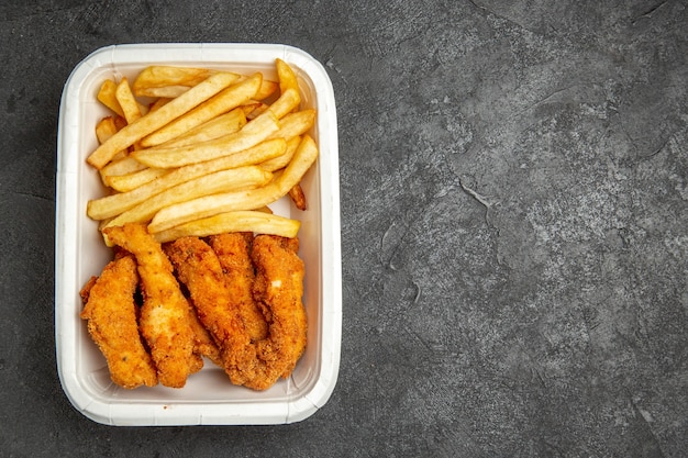 Free photo fried chicken with fried potatoes for celebration