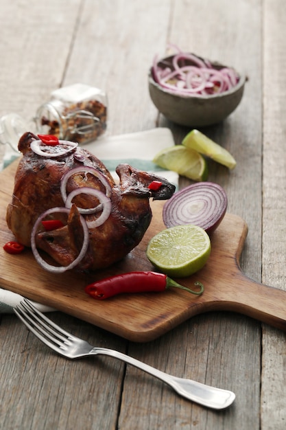 Fried chicken with onion and chili pepper