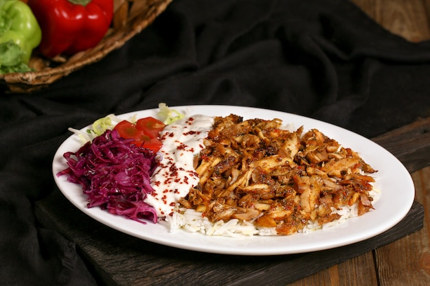 Free photo fried chicken with spices and rice