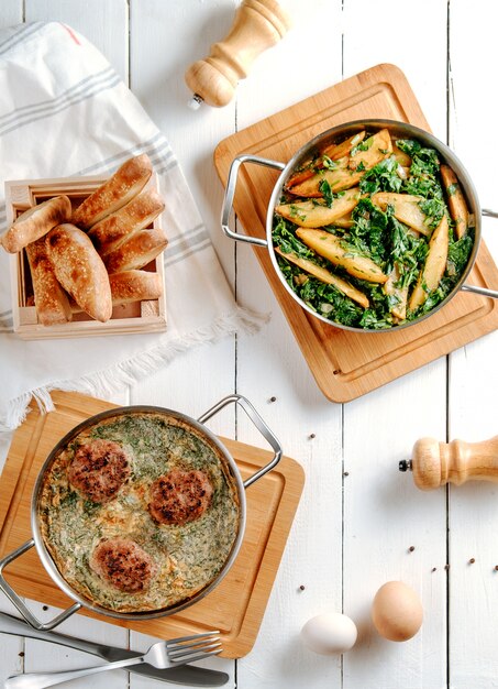 Fried cotletes and potatoes on the table top view