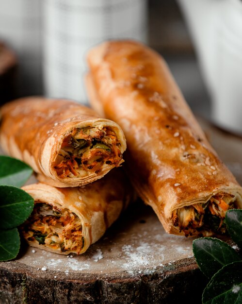 Fried crepe with vegetables on the table