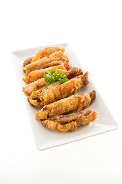 Fried crispy pork isolated on white background