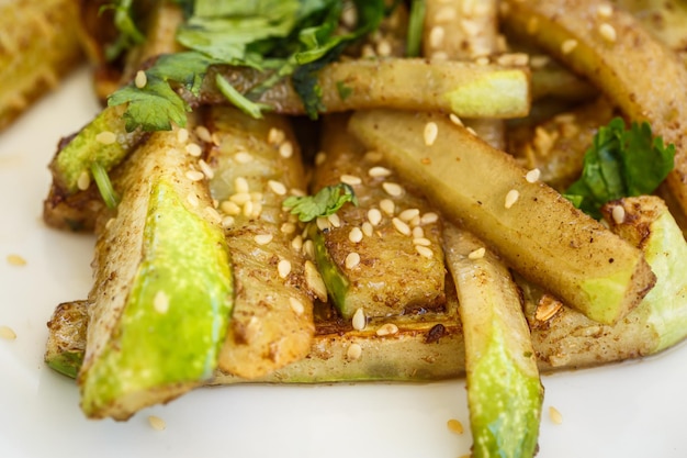 Fried cucumber with sesame seeds