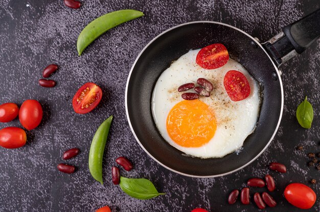 Fried egg in a frying pan.