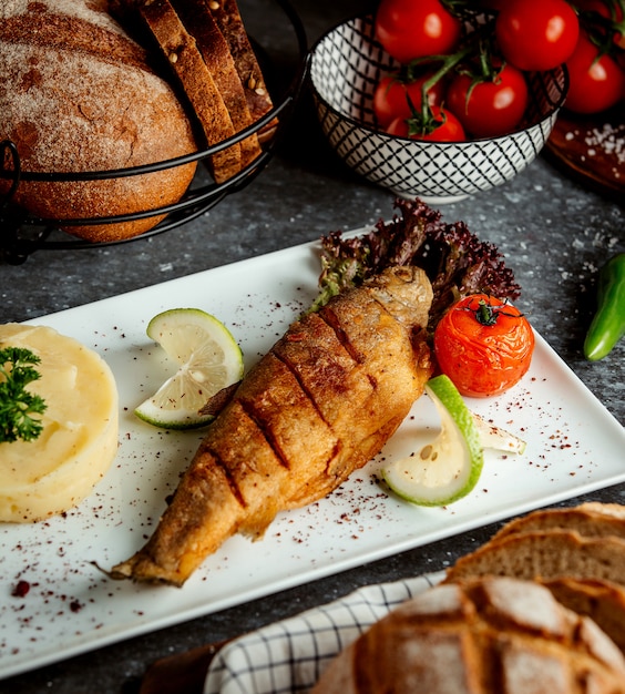 Fried fish with potato mash