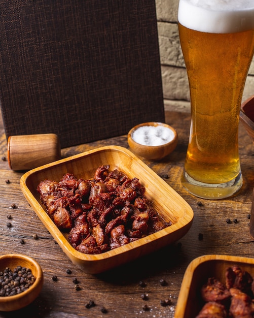 Fried meat served with beer