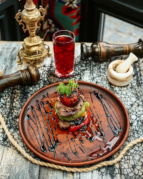 Fried meat with vegetables on the table