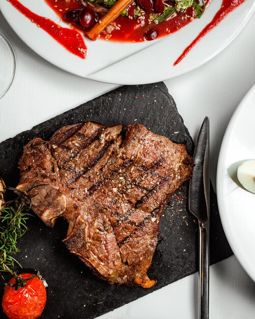 Fried peace of steak on the table