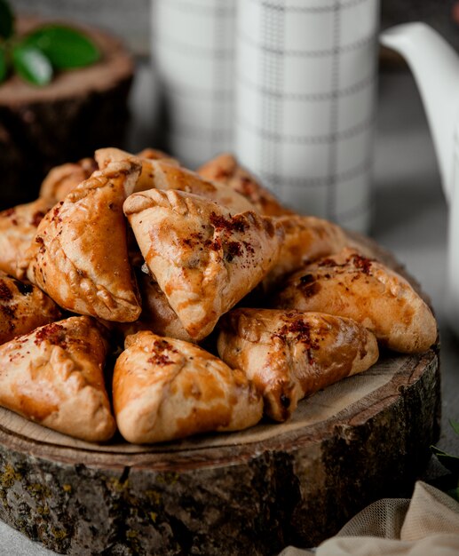 Fried pies with meat on the table