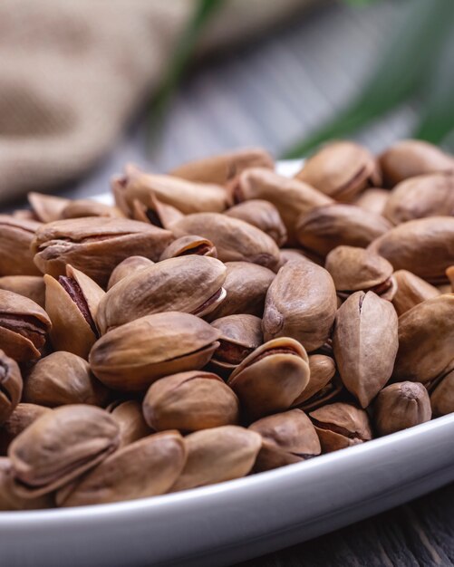 Fried pistachios on the table side view