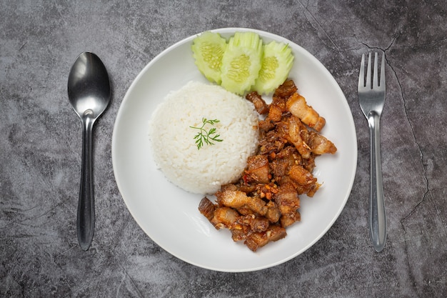Fried pork with garlic and pepper served with rice