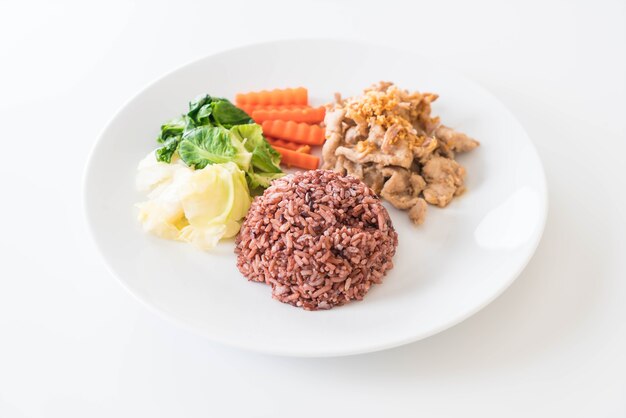 Fried pork with garlic and pepper with berry rice