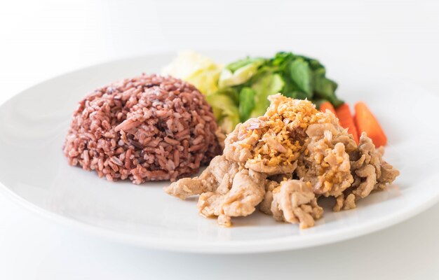 Fried pork with garlic and pepper with berry rice