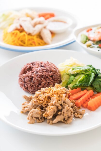 Fried pork with garlic and pepper with berry rice