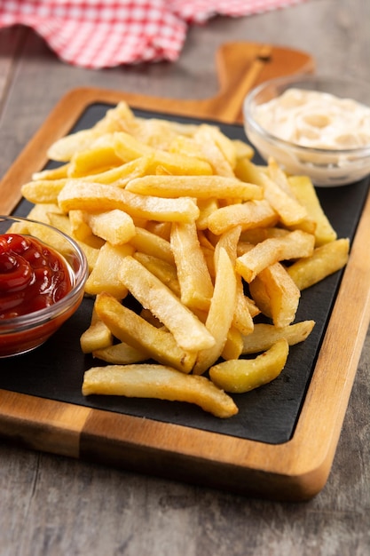 Fried potatoes with ketchup and mayonnaise