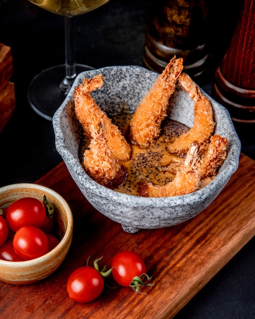 Fried prawns in garlic sauce side view