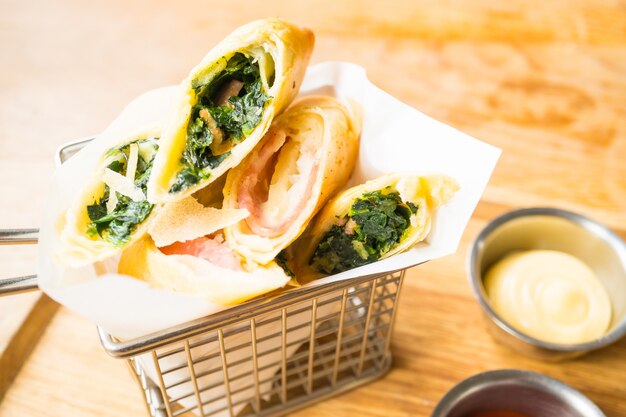 Fried spring roll with ham cheese and spinach vegetable