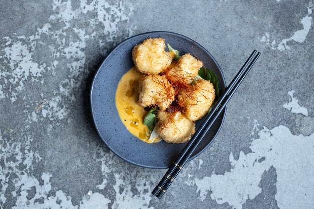 Fried vegetarian balls served in bowl