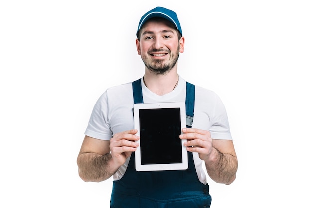 Friendly deliveryman with tablet