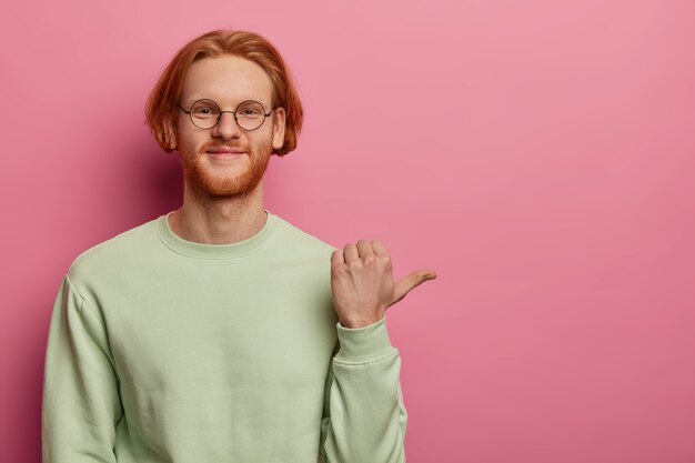 Friendly happy hipster guy tells about awesome company