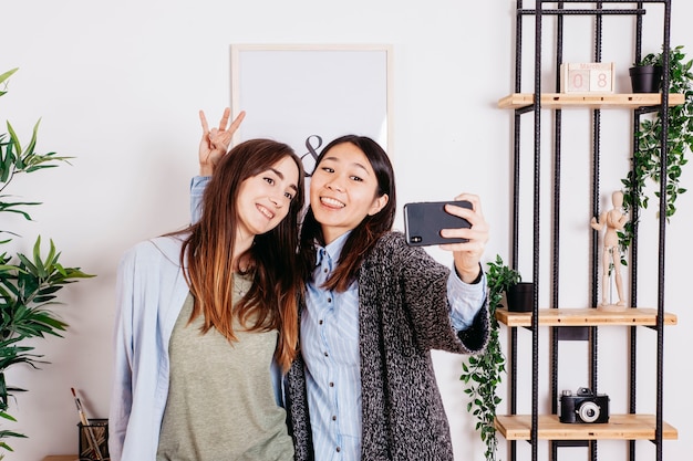 Friendly women posing for selfie