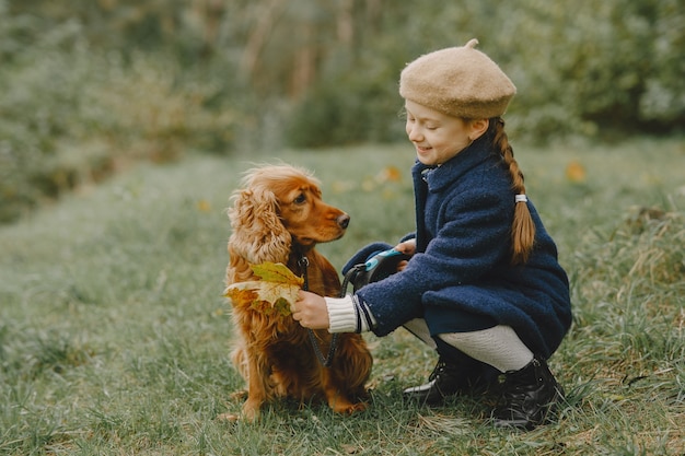 Free photo friends are having fun in the fresh air. child in a blue coat.