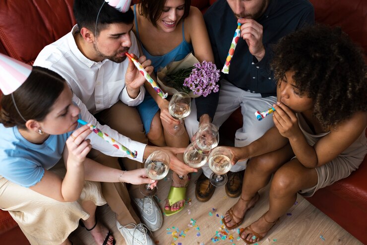 Free Photo friends celebrating together high angle