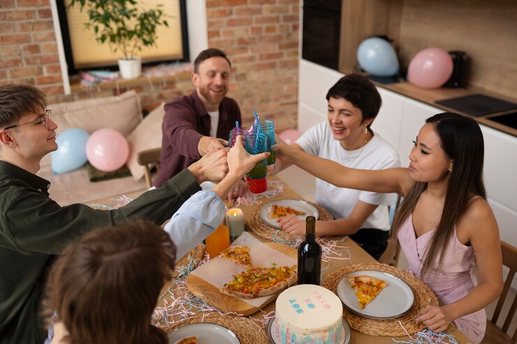 Free Photo friends celebrating together high angle