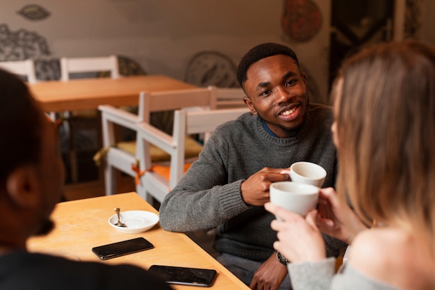 Friends chatting at restaurant