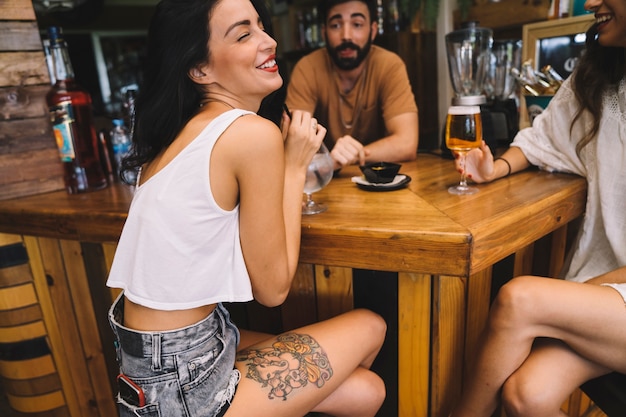 Friends chatting at table