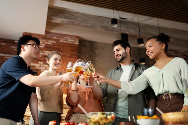 Friends clinking glasses champagne