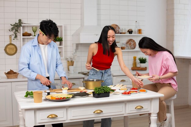 Friends cooking japanese food together