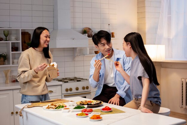 friends cooking japanese food together