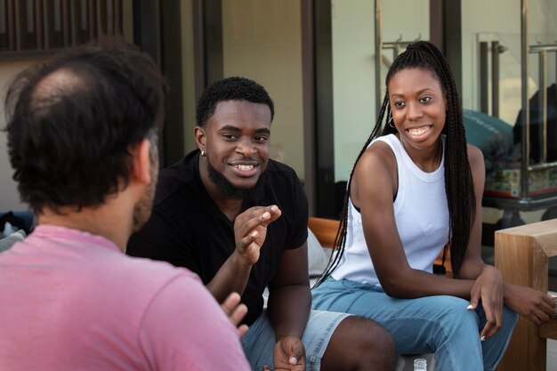 Friends cooking together on a barbecue