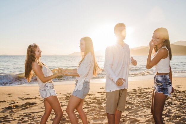 Friends dancing and joking