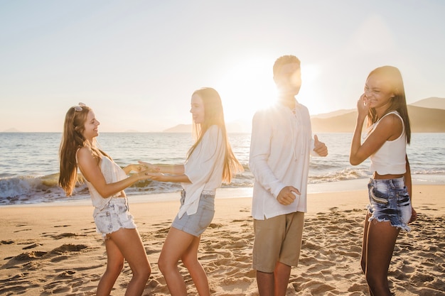 Friends dancing and joking