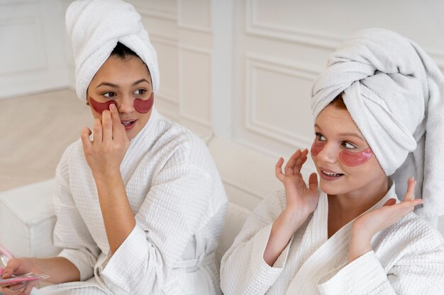 Friends doing their nail care routine together