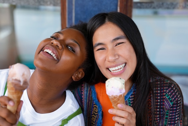 Free photo friends enjoying ice cream together