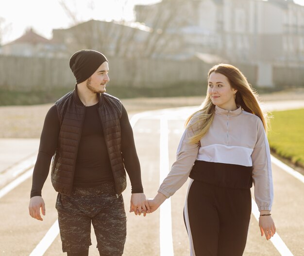 Friends fitness training together outdoors living active healthy