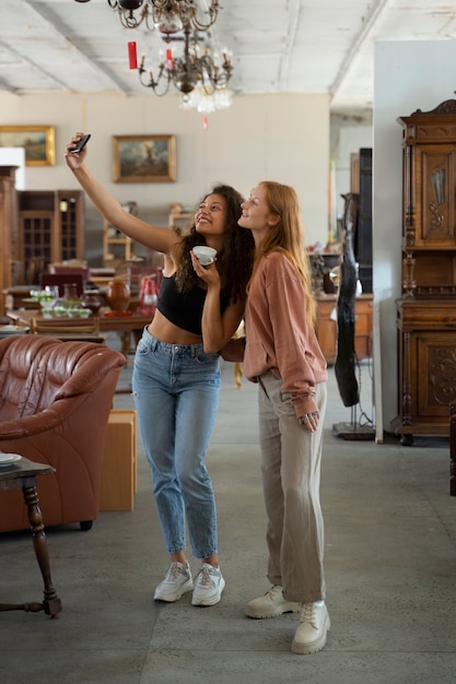 Friends going shopping in antique store