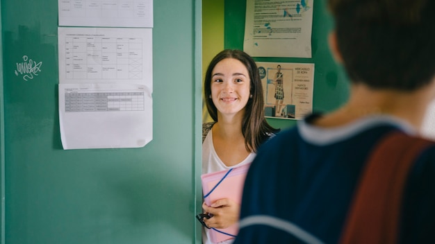 Friends greeting in school